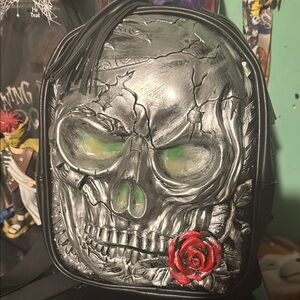 customSkull Designed Backpack with Red Rose Accent. Never used. Glows in dark.